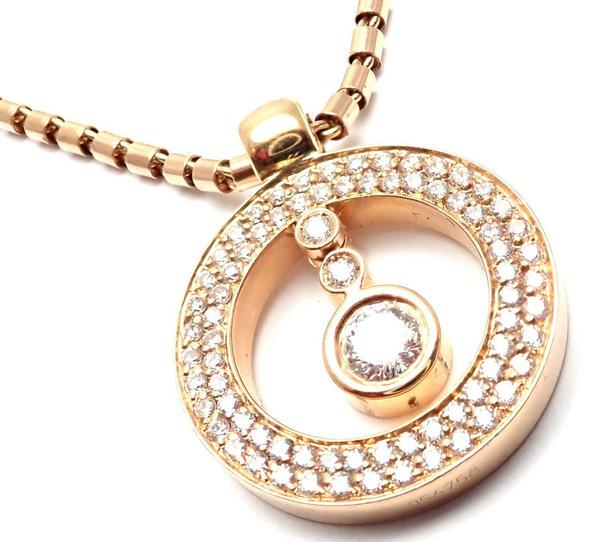 Authentic! Roberto Coin Cento 18k Rose Gold .80ct: More About the Piece: Metal: 18k Rose Gold Measurements: Length: 18" Pendant: 24mm with bail, 19mm without bail Chain: 2mm Weight: 16.3 grams Stones: Round brilliant cut diamonds total weight approx.