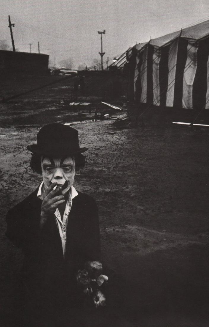 BRUCE DAVIDSON - The Clown: Artist: BRUCE DAVIDSON Print Title: The Clown Medium: Photo-lithograph Printed 1970’s in Italy Image size (inches) approx. 12 x 7.5” Reserve: $25.00 Shipping: Domestic: Flat-rate of $15.00 to anyw