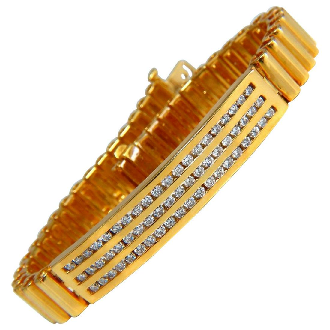 2.00Ct Round Diamonds ID Tag Bracelet 14 Karat Channel: Smooth Concave Link ID Tag Bracelet Durable, Well Made 2.0ct Natural Diamonds Rounds, Full cuts H-color Si-1 clarity. 14kt. yellow gold 8 inch long 10mm wide id bar 14kt. yellow gold 50.1 Grams $5000