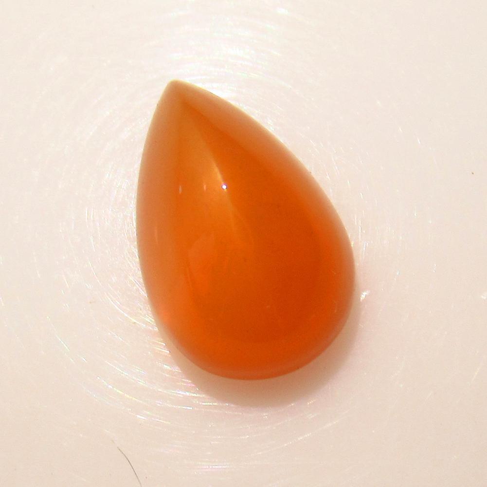 5.83 Ctw Natural Orange Moonstone 14X9 mm Pear Cab: No Reserve! Title: 5.83 Ctw Natural Orange Moonstone 14X9 mm Pear Cab Stone Clarity: Transparent Gemstones: Moonstone Carat Weights: 5.83 Size/Dimensions: 14.10 x 9.10 x 7.70 mm Additional Information