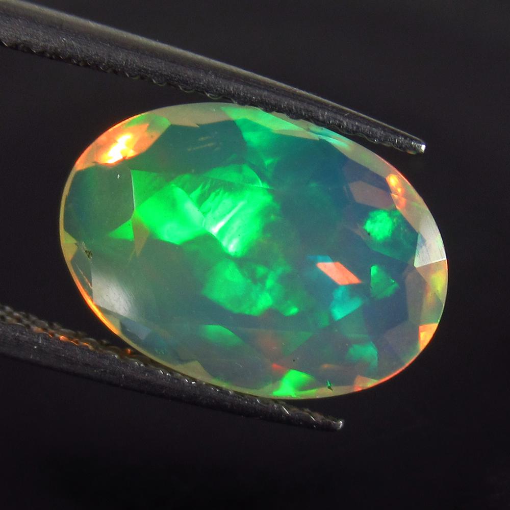 2.31 Ct Genuine Multi-Color Fire Faceted Opal Oval Cut (1 of 2)