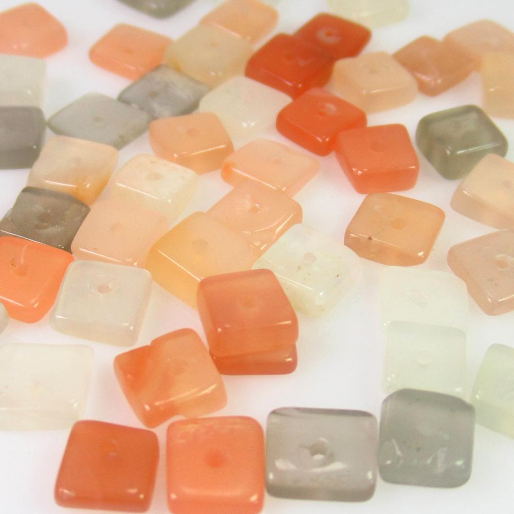 18.93 Ct Genuine 52 Drilled Moonstone Square Beads: No Reserve! Title: 18.93 Ct Genuine 52 Drilled Moonstone Square Beads Stone Clarity: Transparent Loose Gemstone: Natural Moonstone Beads Carat Weights: 18.93 Dimensions: 4.50 - 5.50 mm / 52 PC's Drill