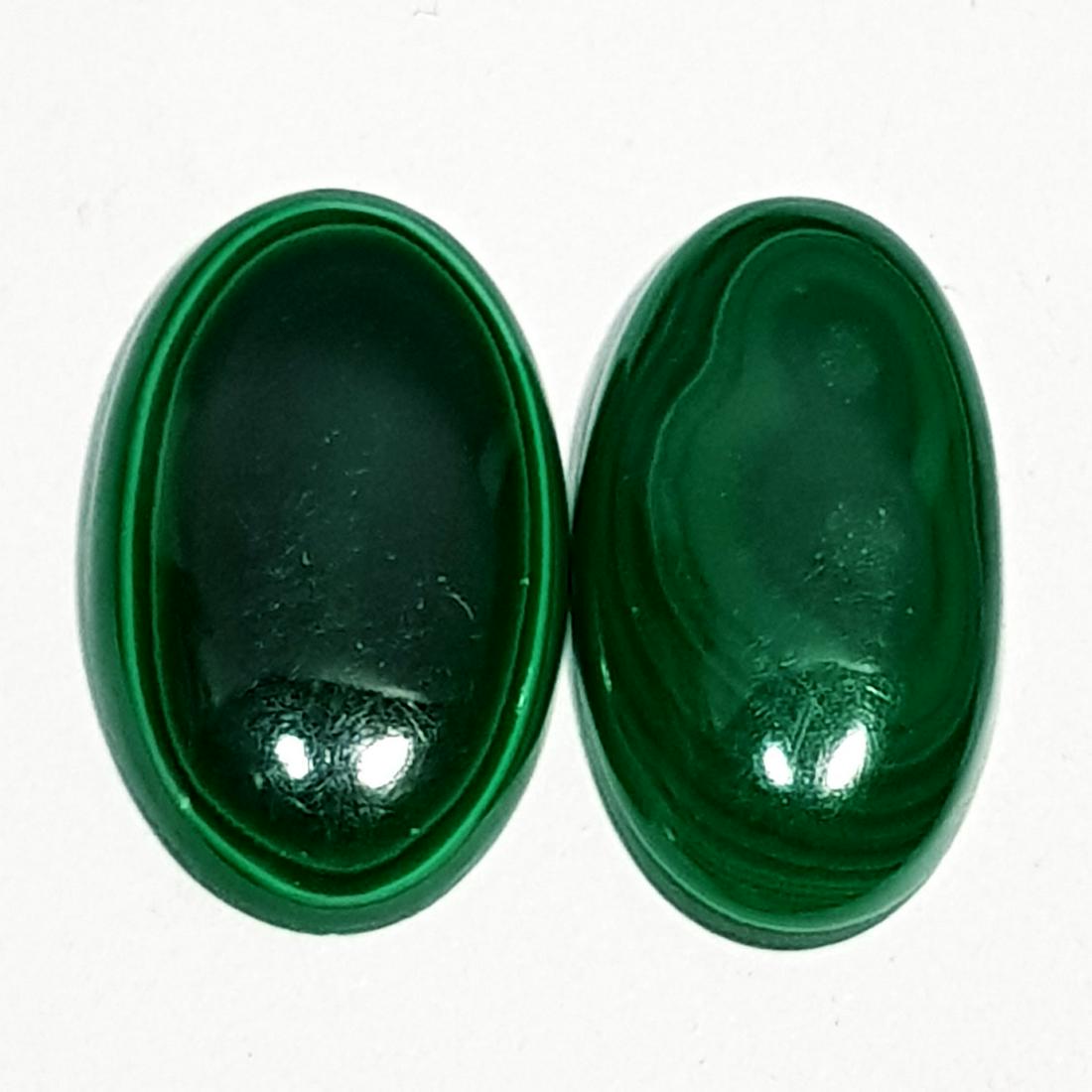 22.70 ct Pair of Natural Malachite: No Reserve! Title: 22.70 ct Pair of Natural Malachite Color/Clarity: Opaque Gemstones: Loosegemstone Carat Weights: $23 Size/Dimensions: 20.50 x 11.30 x 4.50/20.30 x 12.50 x 3.70 Additional Informatio