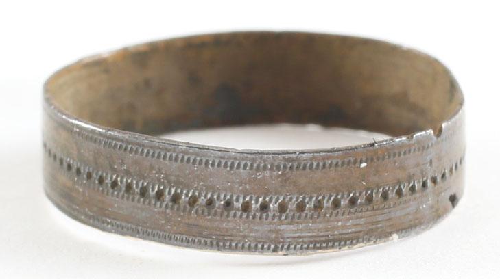 RARE VIKING WOMAN’S WEDDING RING, 866-1067 AD. SIZE 7: No Reserve! Copper originally gilt, size 7 ¼. Broad band, 5.8mm, with flat face decorated with a median angled chiseled stipple band and fine stipple band to the edges. Fine glossy dark brown patina.