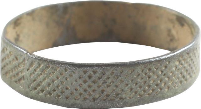 VIKING WOMAN’S WEDDING RING, 9TH-10TH AD, SIZE 7 1/2.: No Reserve! Bronze, size 7 1/. Broad, 4.7mm ban, the medial with fine lattice decoration. Dark mottled patina with crisp detail. Vikings exchanged rings on the pommel of the groom’s sword. Gift boxe