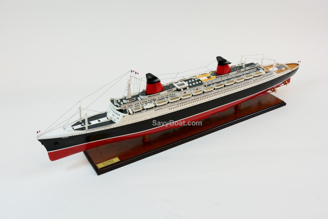 SS France: Dimension approx.: (All sizes are in inches) 41.5 L x 4.5 W x 11.5 H – Scale 1:300; The model is already built, NOT a model ship kit; Handcrafted from scratch using finest woods & metal fittings Res