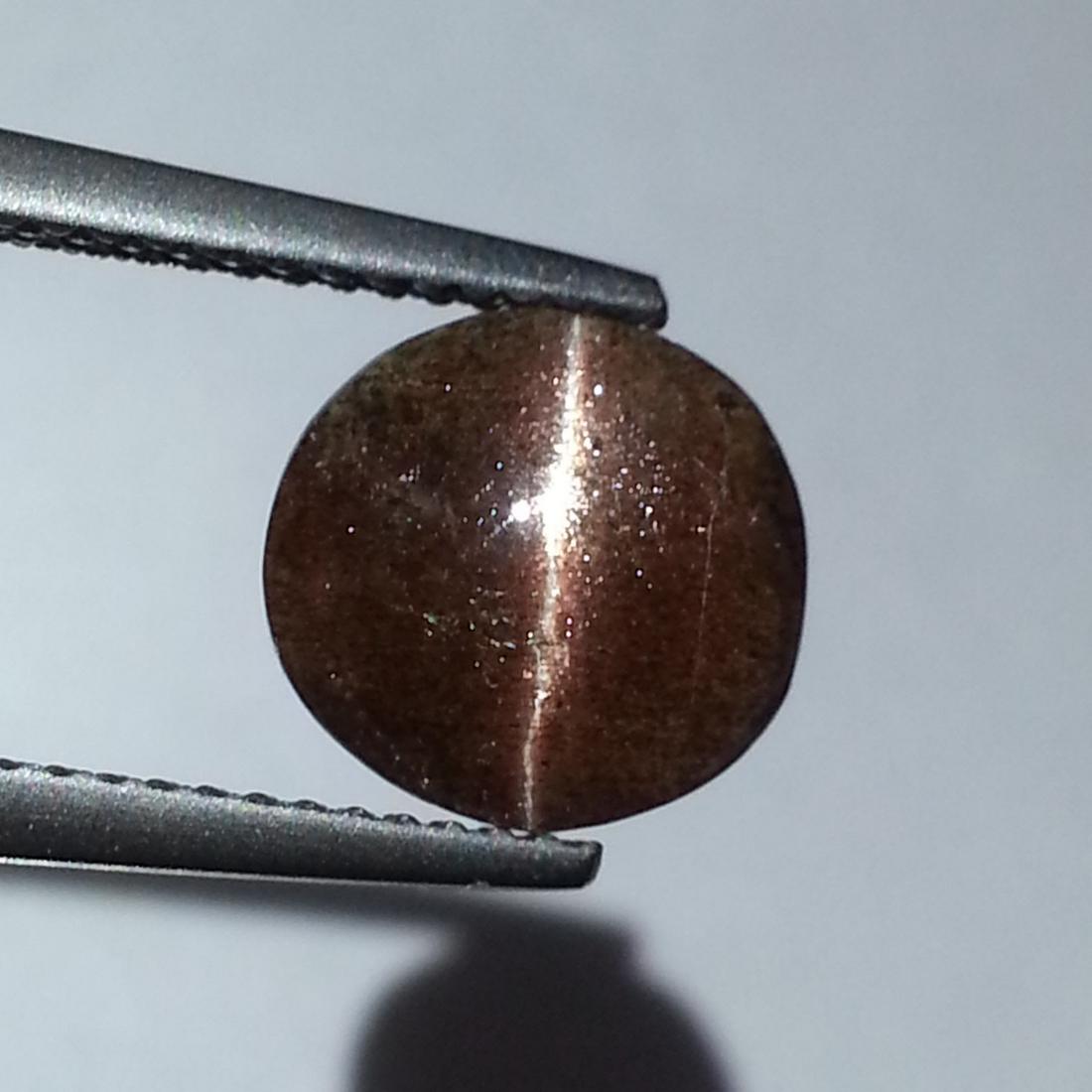 Natural Scapolite Cat's Eye 3.70 ct: No Reserve! Title: Natural Scapolite Cat's Eye 3.70 ct Color/Clarity: Opaque Gemstones: Loosegemstone Carat Weights: 3.7 Size/Dimensions: 9.60 x 9.10 x 5.30 Additional Information: Round- Africa Shipp