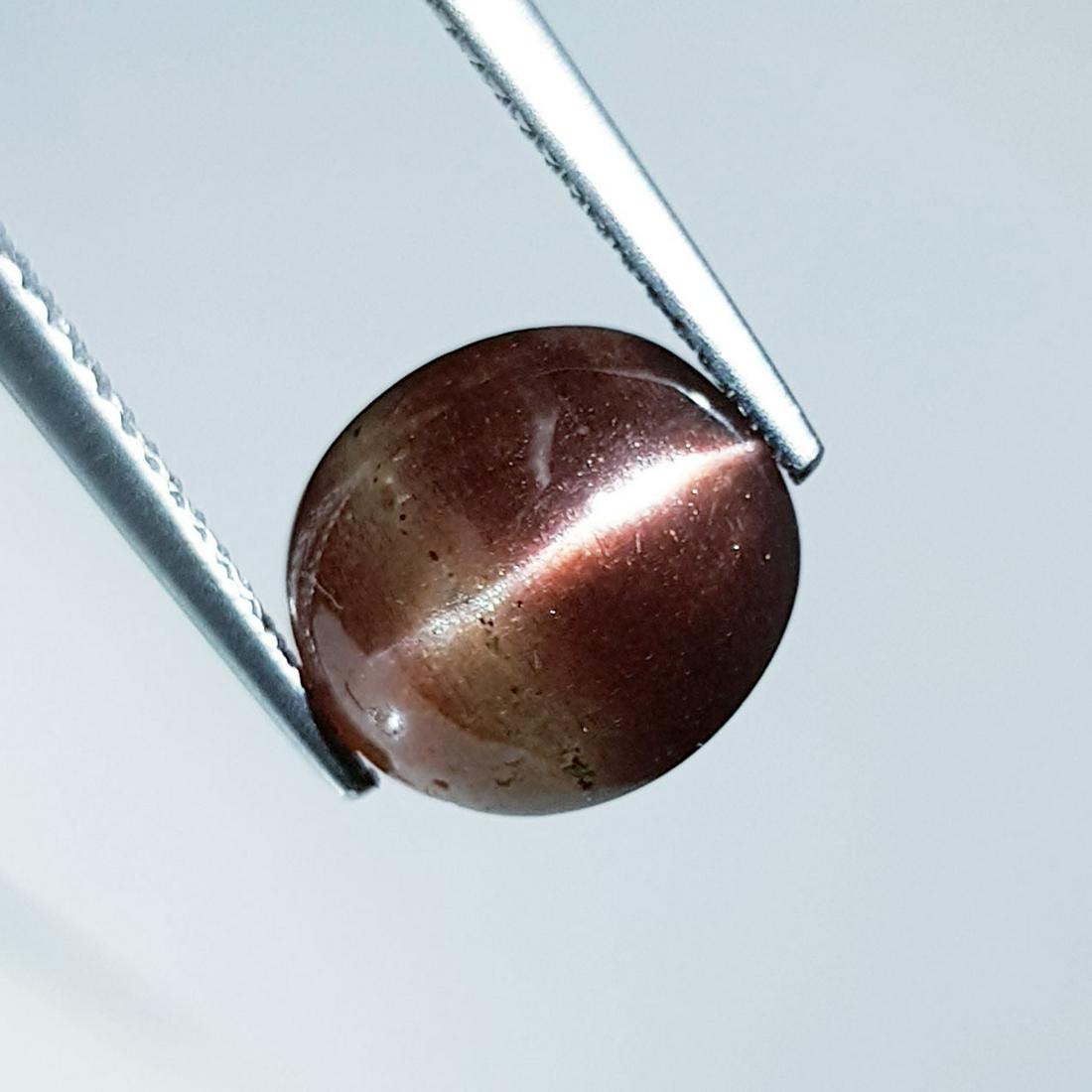 4.50 ct Natural Scapolite Cat's Eye: No Reserve! Title: 4.50 ct Natural Scapolite Cat's Eye Color/Clarity: Opaque Gemstones: Loosegemstone Carat Weights: 4.5 Size/Dimensions: 10.40 x 9.80 x 6.30 Additional Information: Round - Africa Shi