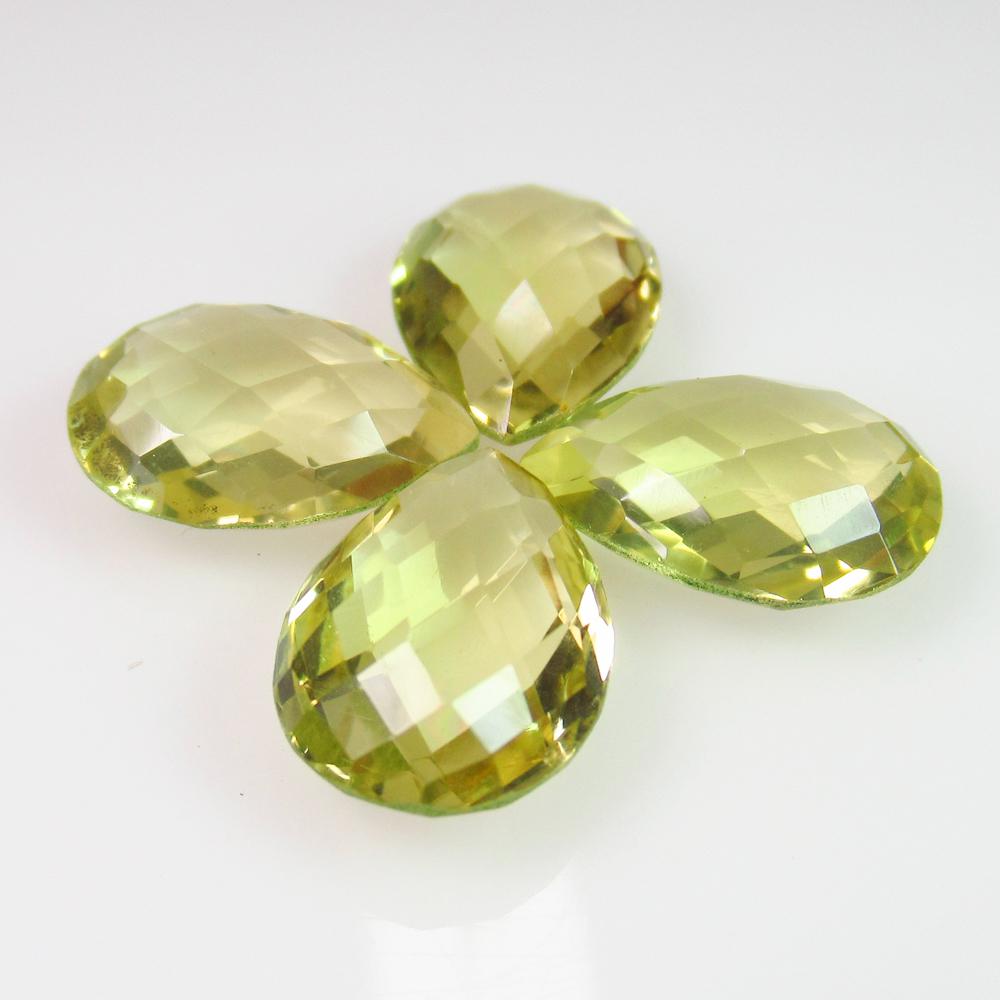 18.43 Ct Genuine 4 Lemon Quartz Pear Checkerboard Cut: No Reserve! Title: 18.43 Ct Genuine 4 Lemon Quartz Pear Checkerboard Cut Stone Clarity: VVS Gemstones: Natuarl Lemon Quartz Carat Weights: 18.43 Size/Dimensions: 14.10 x 10.20 x 5.80 mm / 4 PC's Addit