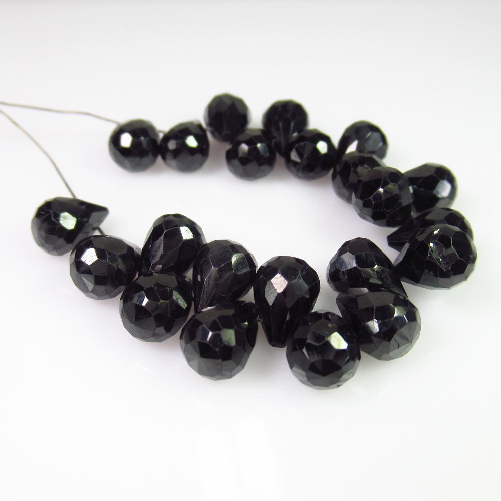 50.67 Ct Genuine 22 Drilled Black Spinel Pear Drop: No Reserve! Title: 50.67 Ct Genuine 22 Drilled Black Spinel Pear Drop Beads Stone Clarity: Opaque Gemstones: Natural Black Spinel Beads Carat Weights: 50.67 Size/Dimensions: 7.5x6.0 to 8.5x6.0 mm / 22