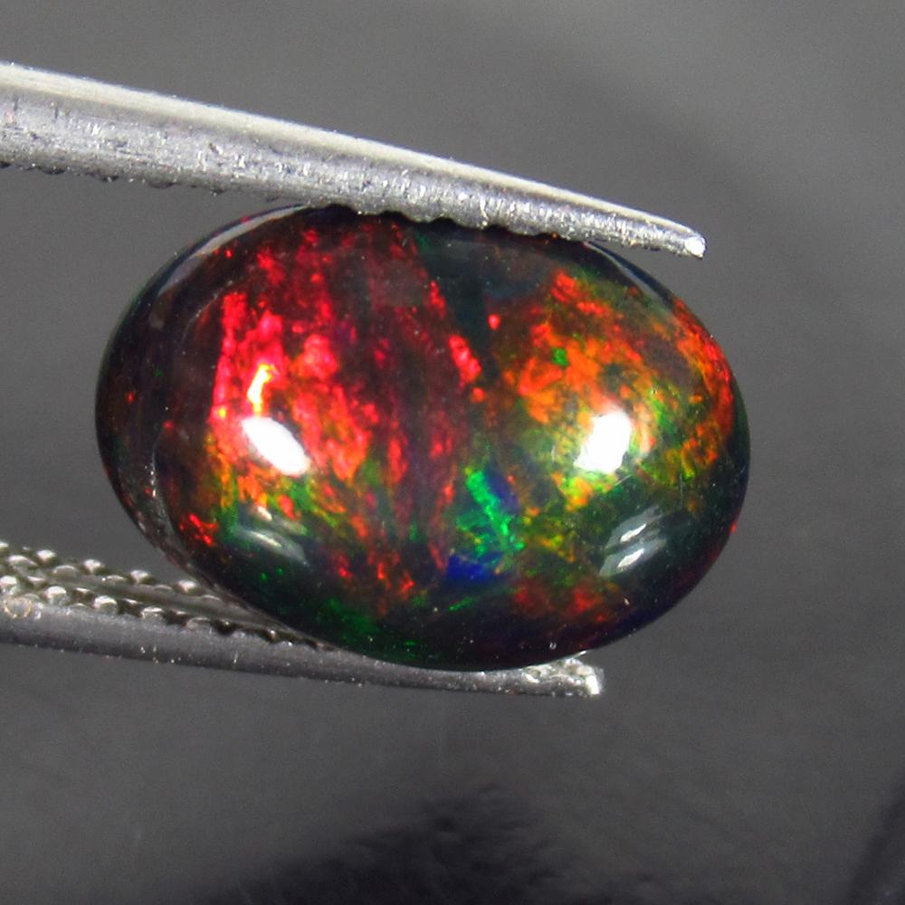 1.75 Ct Genuine Ethiopian Fire Black Opal Oval Cab (1 of 2)