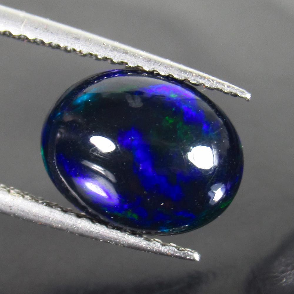 2.01 Ct Genuine Ethiopian Fire Black Opal 11X8.5 mm (1 of 2)