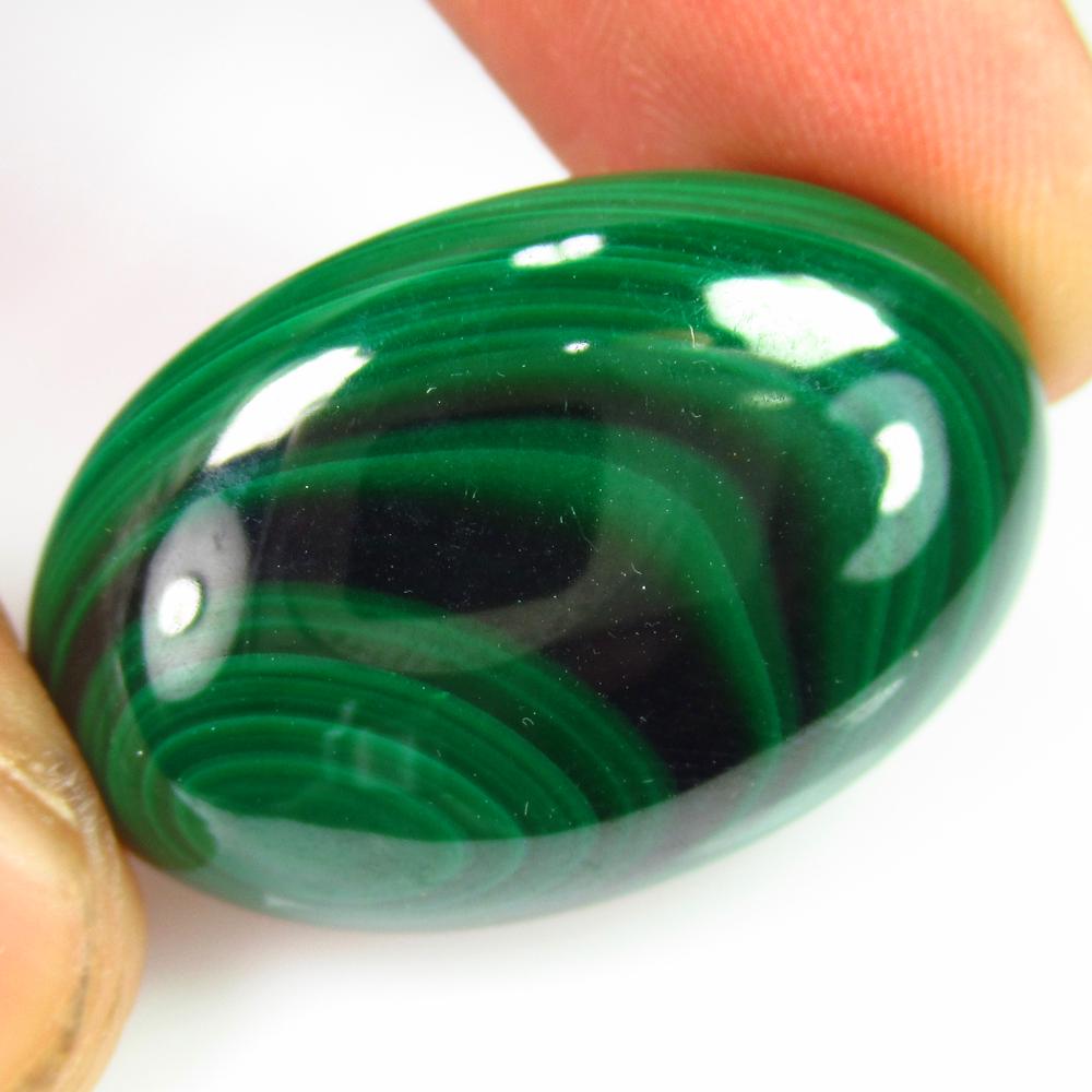 53.20 Ct Genuine Green Malachite Oval Cab: No Reserve! Title: 53.20 Ct Genuine Green Malachite Oval Cab Stone Clarity: Opaque Gemstones: Natural Malachite Carat Weights: 53.20 Size/Dimensions: 30.00 x 19.80 x 7.50 mm Additional Information: Ni