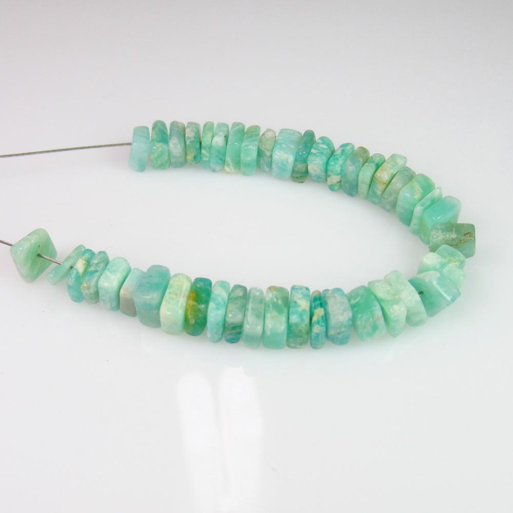 29.17 Ct Genuine 48 Drilled Amazonite Square Flat Beads: No Reserve! Title: 29.17 Ct Genuine 48 Drilled Amazonite Square Flat Beads Stone Clarity: Transparent Gemstones: Natural Amazonite Beads Carat Weights: 29.17 Size/Dimensions: 5.3x5.3 to 5.9x5.9 mm / 4