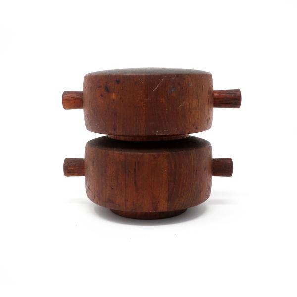 Teak “Rosie” Salt & Pepper by Jens Quistgaard for Dansk: An iconic Danish Modern teak salt shaker and pepper grinder designed by Jens Quistgaard for Dansk and named “Rosie” after The Jetsons’ robot maid. In good vintage condition with wear consistent
