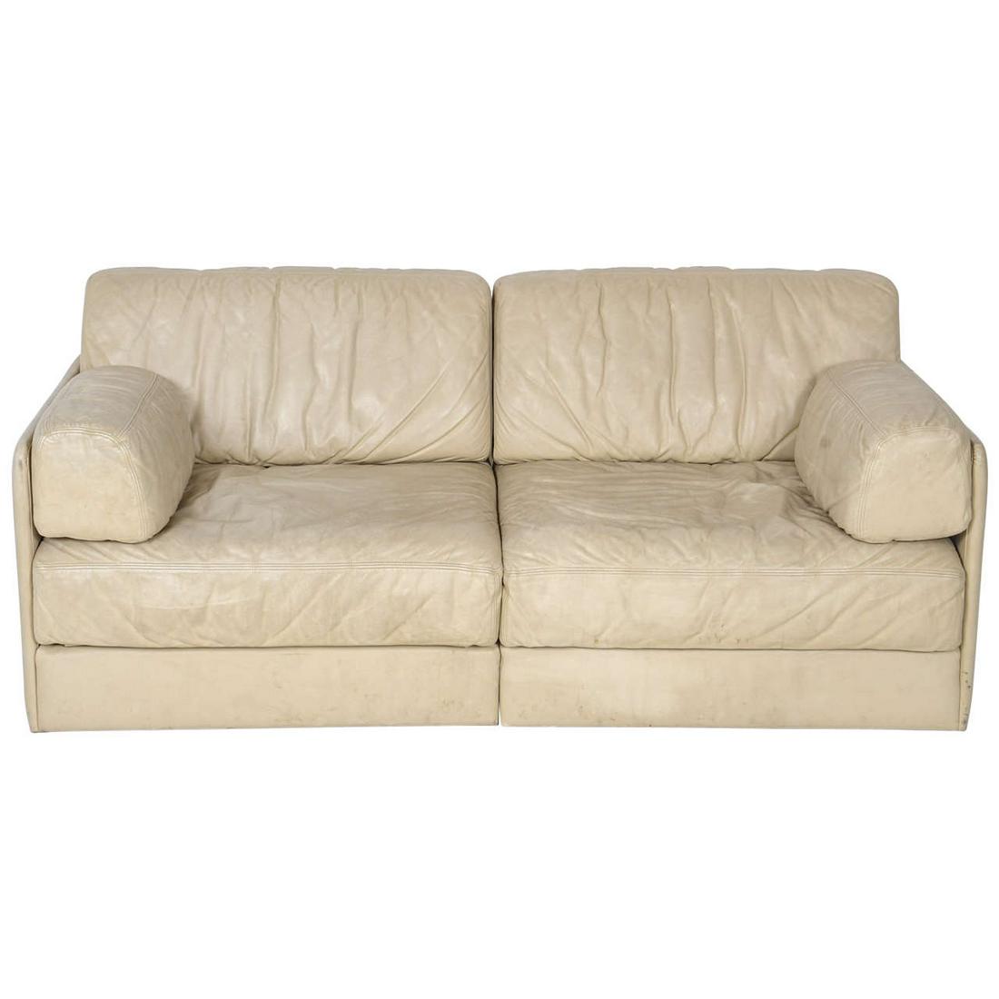Rare Off-White De Sede DS-76 Sectional Two-Seat Sofa: Rare to find beautiful off-white colored ds-76 sofa by high end manufacturer De Sede from Switzerland. The two elements fold out to a comfortable full double bed. Details Creator De Sede (Designer) In