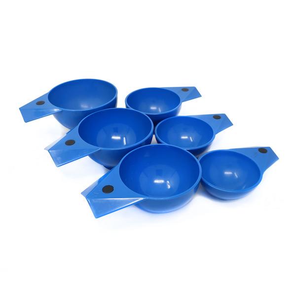Set of Vintage Magnetic Crown Corning Measuring Cups: This set of six blue measuring cups by Crown Corning Glassworks nest together magnetically and have geometric detailing on the handle. 3.75” x 5” x 3” Reserve: $25.00 Shipping: Domestic: Flat-ra