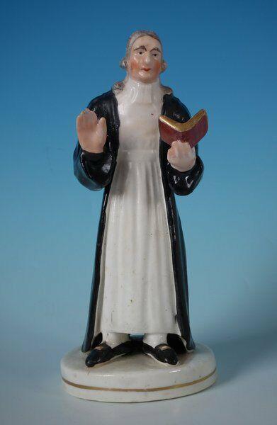 Staffordshire Pottery Figure of John Wesley: Title: Staffordshire Pottery Figure of John Wesley Description: Staffordshire Pottery Figure of John Wesley Description Staffordshire Pottery porcellaneous figure with a religious theme which features