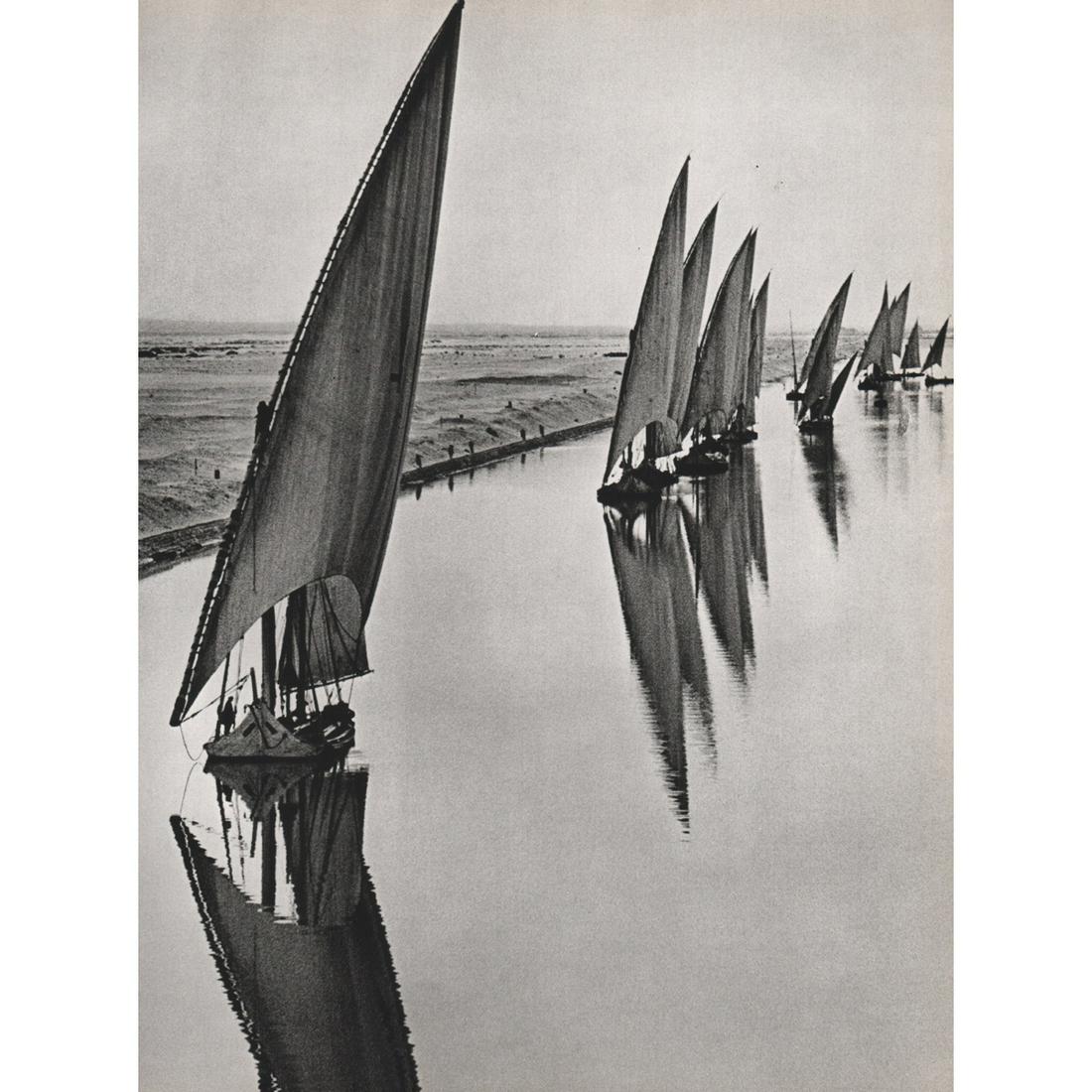 ALFRED EISENSTAEDT - Egyptian Fishing Boats, Suez Canal: Artist: ALFRED EISENSTAEDT Print Title: Egyptian Fishing Boats in the Suez Canal Medium: Sheet-fed Gravure Printing Date: 1960's Printed in Switzerland Image Size approx: 12.5 x 9.5 inches Alfred Eise