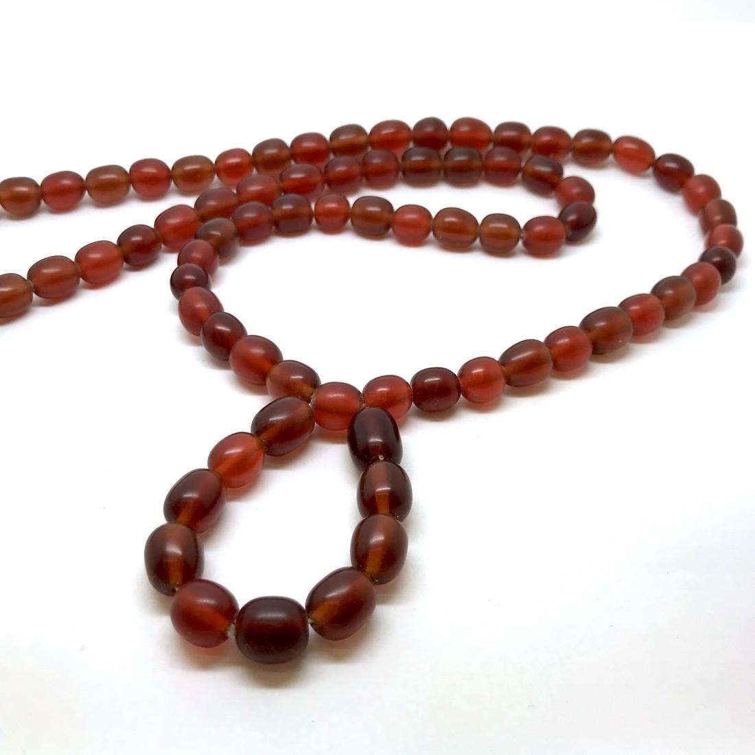 Old long necklace cherry amber coloured beads (1 of 5)