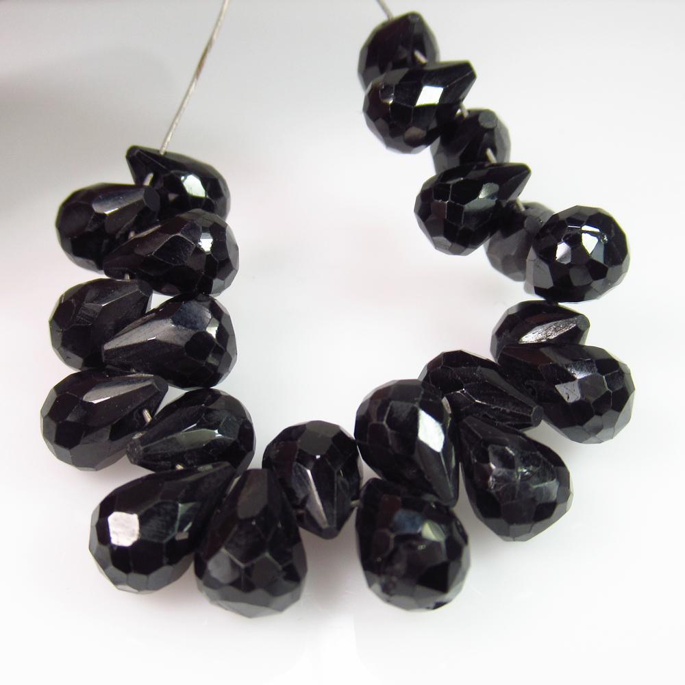 53.03 Ct Genuine 24 Drilled Black Spinel Pear Drop: No Reserve! Title: 53.03 Ct Genuine 24 Drilled Black Spinel Pear Drop Beads Stone Clarity: Opaque Gemstones: Natural Black Spinel Beads Carat Weights: 53.03 Size/Dimensions: 7.9x5.6 to 8.2x5.9 mm / 24