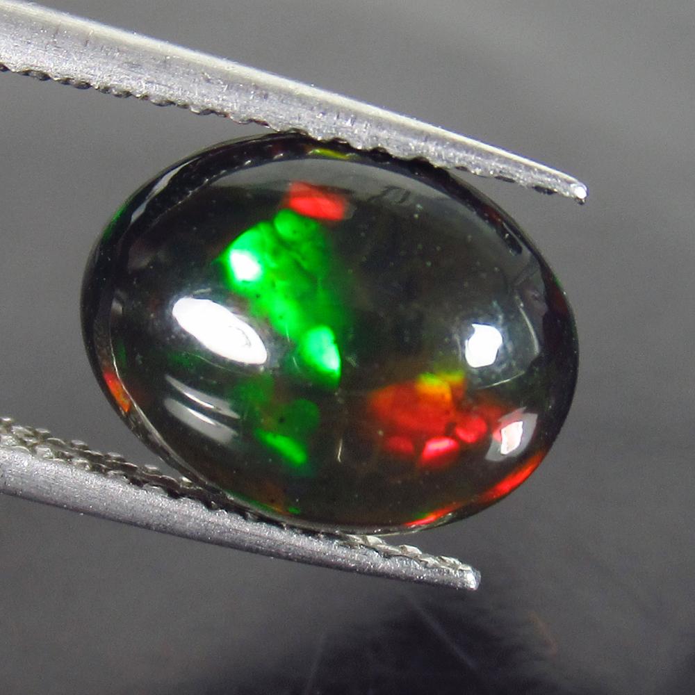 1.82 Ct Genuine Ethiopian Fire Black Opal Oval Cab (1 of 2)