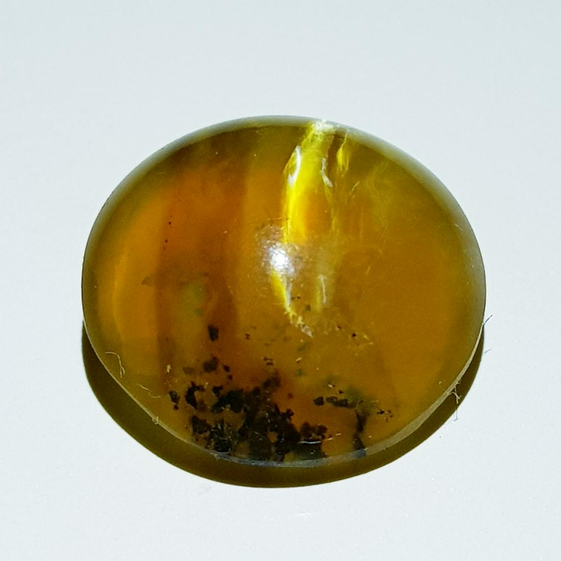 7.62 ct Natural Opal Cat's Eye: No Reserve! Title: 7.62 ct Natural Opal Cat's Eye Color/Clarity: Semi Transparent Loosegemstone Carat Weights: 7.62 Size: 14.60 x 14.60 x 7.00 Round - Africa Shipping: Worldwide: Flat-rate of $10.00 t