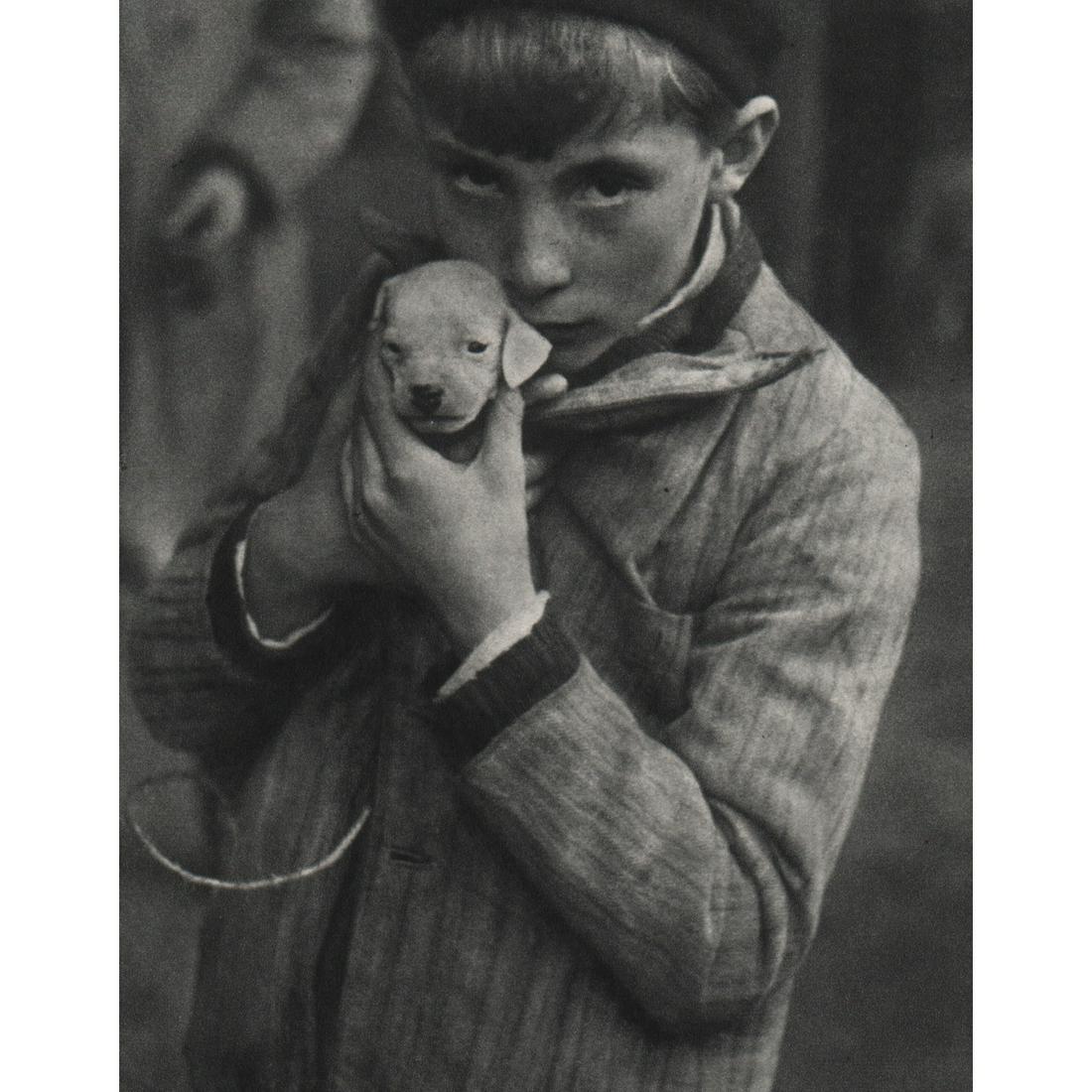 ANDRE KERTESZ - The Puppy, Paris 1928: Artist: ANDRE KERTESZ Print Title: The Puppy, Paris 1928 Medium: Sheet-Fed Gravure Printing Date: 1970's Printed in France Image size approx. 6 x 4.75 inches Andre Kertesz(1894-1985) born Kertesz Ando