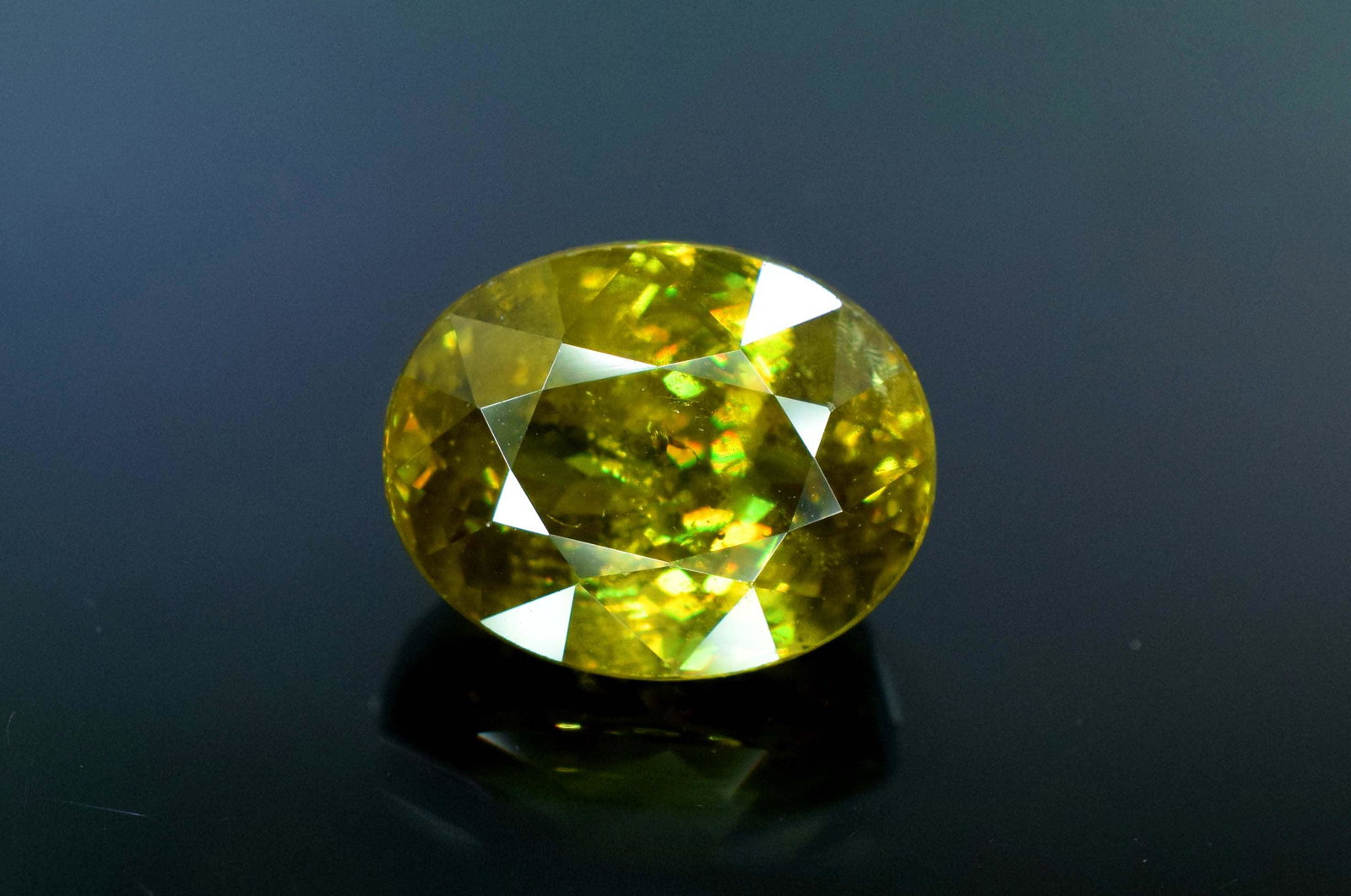 7.30 carats Huge size Oval Cut Full Ultra Fire Sphene: 7.30 carats Huge size Oval Cut Full Ultra Fire Sphene Loose Gemstone From Africa weight : 7.30 carats Dimensions - 12.5*10*08 mm Treatment : Natural origin : Africa DHL EXPRESS SHIPPING The rare colle