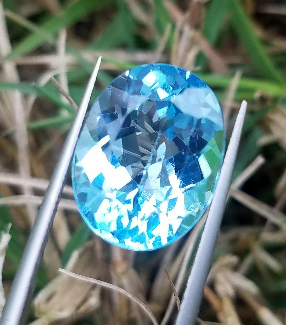 11 Carats Beautiful Swiss Blu Topaz: Title: 11 Carats Beautiful Swiss Blu Topaz Origin:Swiss Gemstones: Topaz Carat Weights: 11 Carats Size/Dimensions: 15x12x8 MM Additional Information: Natural Reserve: $50.00 Shipping: Domestic: F