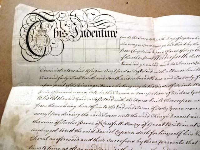 1785 Handwritten Indenture Vicars of Lincoln: Large indenture dated 1785 during the reign of King George III by the Vicars Chorale of the Cathedral Church of the Blessed Virgin Mary of Lincoln and Daniel Caparn, a Baker. Nicely penned on heavy pa