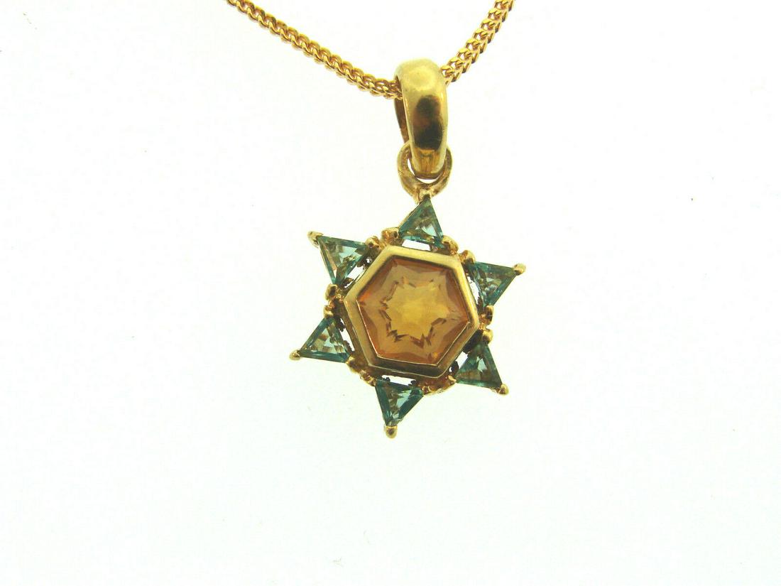 22k Yellow Gold Frosted Laser Jewish Star Citrine &: AK NT0 22k Yellow Gold Frosted Engraved Jewish Star Motif Citrine and Aqua Pendant Necklace · Wonderful necklace that is a great addition to your collection. · Weight is 7.5 grams · Made of 22k Yel