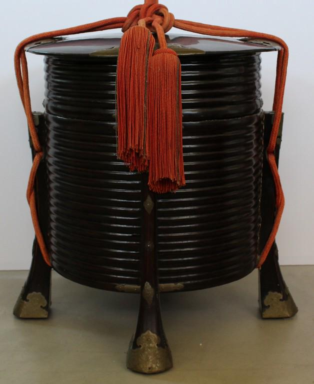 Japanese Meiji Black Lacquer Wood Cylindrical Ribbed: Title: Japanese Meiji Black Lacquer Wood Cylindrical Ribbed Hokai Storage Box Date/Period: Late 19th century Materials: Lacquered wood and brass Dimensions: 18 1/2” high x 16 1/2" diameter Japanese 
