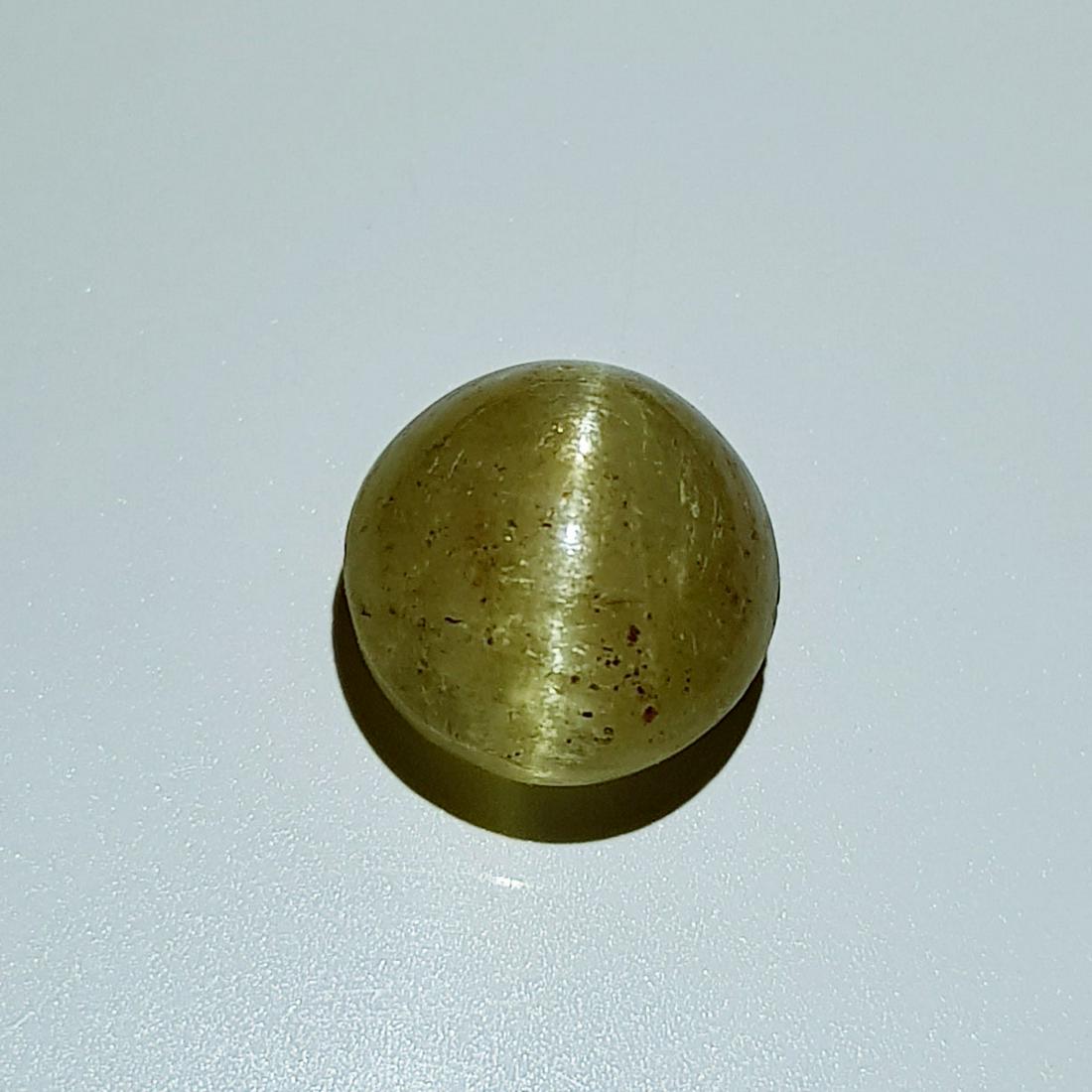 7.40 ct Natural Apatite cat's Eye: No Reserve! Title: 7.40 ct Natural Apatite cat's Eye Color/Clarity: Semi Transparent Gemstones: Loosegemstone Carat Weights: $7 Size/Dimensions: 11.00 x 11.00 x 7.20 Additional Information: Round - Jh