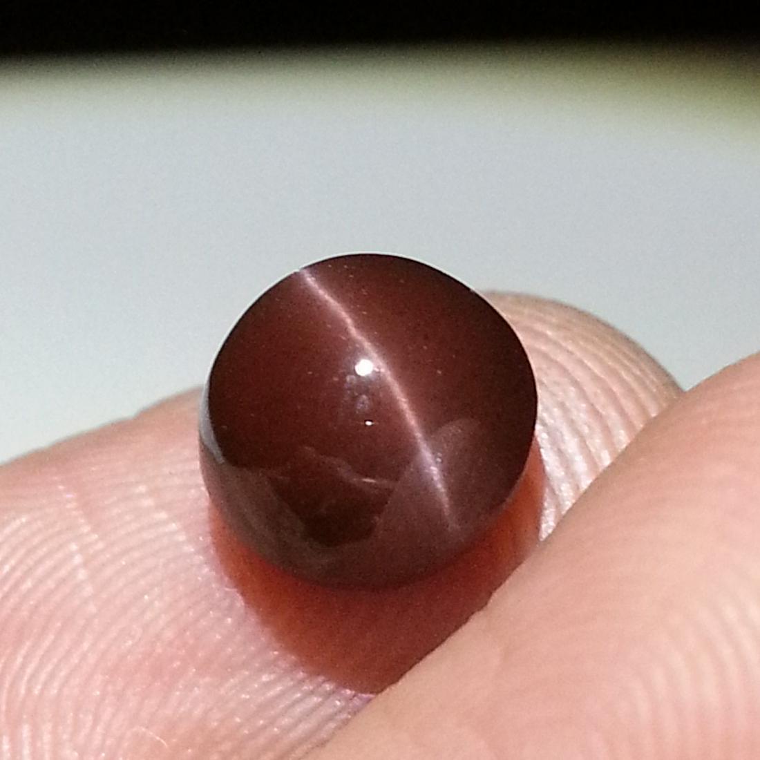 3.07 ct Natural Scapolite Cat's Eye: No Reserve! Title: 3.07 ct Natural Scapolite Cat's Eye Color/Clarity: Opaque Gemstones: Loosegemstone Carat Weights: $3 Size/Dimensions: 8.60 x 8.60 x 5.90 Additional Information: Round - Africa Shipp