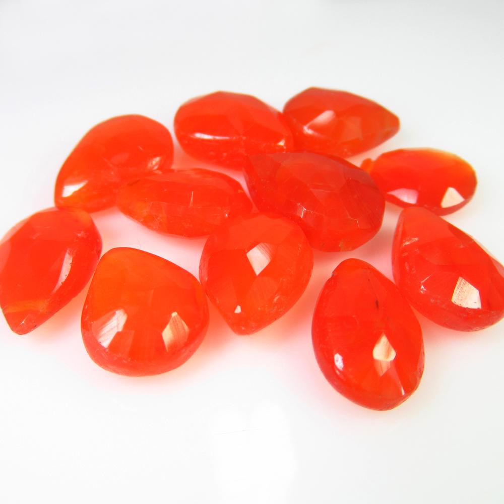 31.14 Ct Genuine 13 Orange Carnelian Drilled Pear Beads: No Reserve! Title: 31.14 Ct Genuine 13 Orange Carnelian Drilled Pear Beads Stone Clarity: Transparent Loose Gemstone: Natural Carnelian Beads Carat Weights: 31.14 Size/Dimensions: 10.1x8.1 - 10.6x8.3 