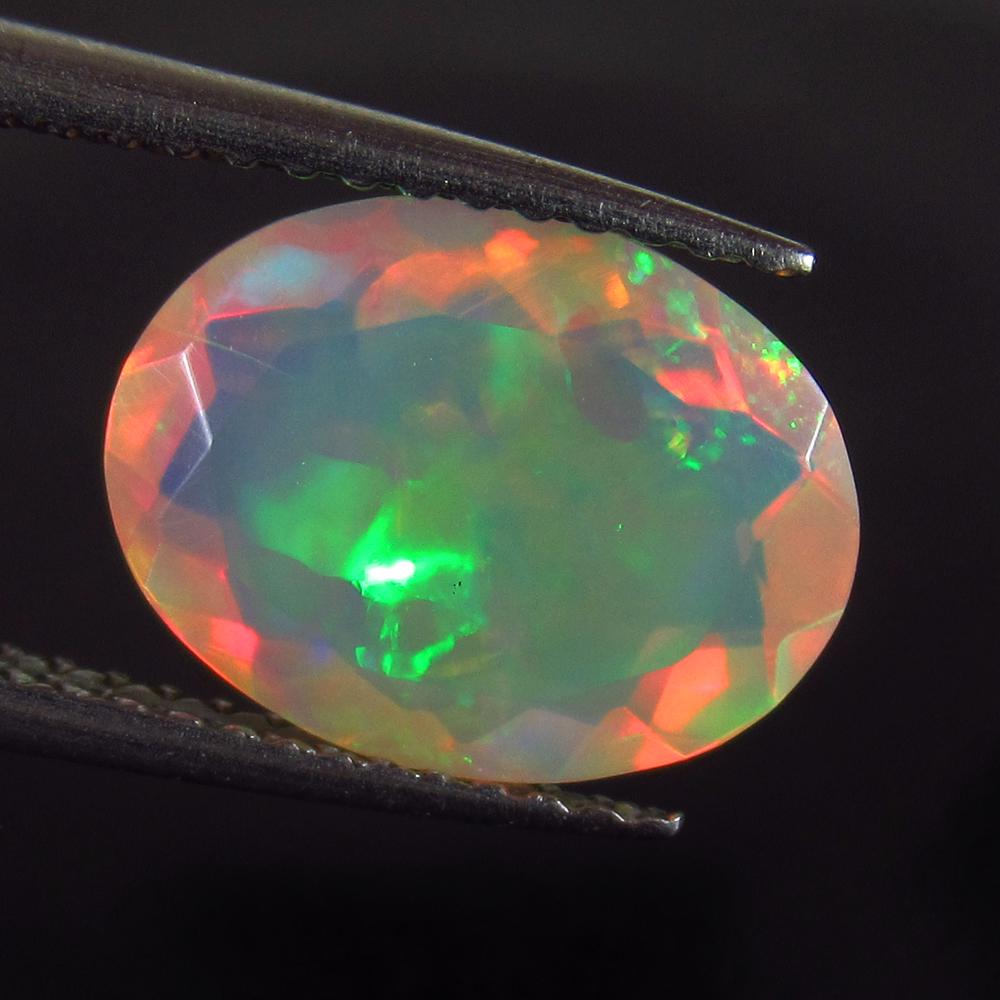 1.86 Ct Genuine Multi-Color Fire Faceted Opal Oval Cut (1 of 2)