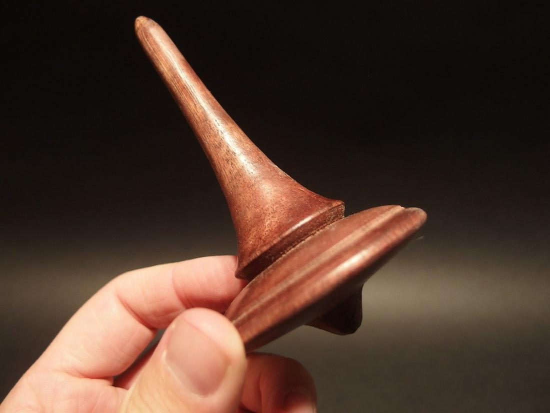 Wood Spinning Top Toy: 4 1/2" Tall x 2 5/8" wide Wonderful reproduction american antique wood turned spinning top. Handmade wood spinning tops like this were some of the oldest and simplest toys made. Children who frequentl