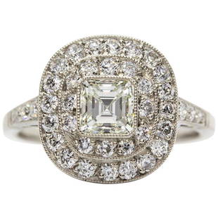 Platinum Diamonds Engagement Ring: This is a one of a kind ring that was handcrafted in solid platinum. This stunning design displays one Asscher cut diamond of H-VVS2 quality that weighs 0.70ctw. Stunning and shinning, this lovely