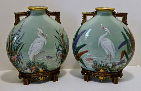 Antique Pair Royal Worcester Pate Sur Pate Vases: This pair of porcelain vases was produced in England by Royal Worcester in 1873. The vases measure 10 3/8 inches high, 3 ½ inches wide and 8 ½ inches in length. They were made in the Aesthetic