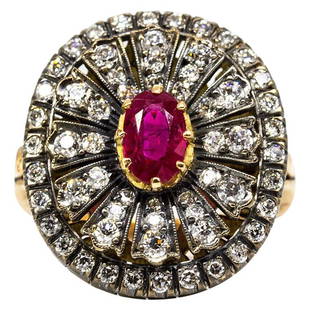 Enticing 18 Karat Gold and Silver Burma Ruby and: This one of a kind ring is centered with a natural oval cut Burma ruby that weighs 1.02ctw. Handmade in 18k gold, this fabulous piece of jewelry showcases 60 old mine cut diamonds of H-VS2 quality