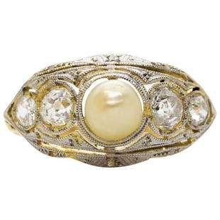 Original Art Deco Diamonds and Pearl Ring: One natural pearl that measures 6mm in diameter constitutes the central stone of this enticing piece of jewelry. At both sides of the central stone, this ring displays 2 old mine cut diamonds of