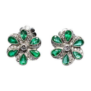 Estate Platinum Emerald and Diamond Earrings: Composition: Platinum. Stones: • 12 natural pear shape emeralds that weigh 2.50ctw. • 32 Old European cut diamonds of that weigh 0.70ctw. Earrings measure: 16mm by 15mm Thick: 4mm Total weight: