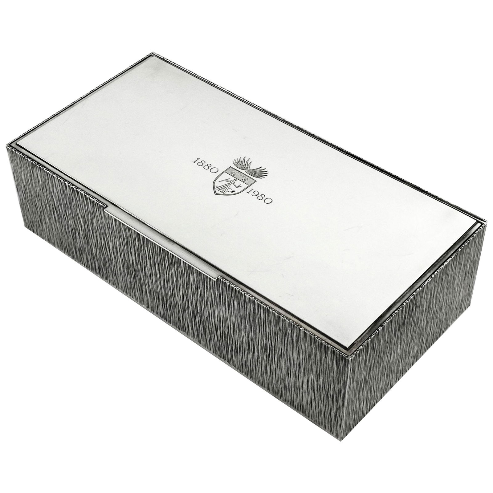 GERALD BENNEY STERLING SILVER CIGAR BOX / CIGARETTE BOX: 1981 London A gorgeous Solid Silver Cigar Box by the acclaimed post war Silversmith Gerald Benney. An elegant rectangular box with a bark effect on the sides and underside. The lid is polished silver