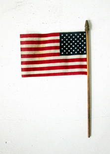 Vintage Parade Flag: Title: Vintage Parade FlagDate/Period: Mid 20th CMaterial: Cotton & MapleDimension: 10 3/4”H X 6 3/8”WProvenance:Pole with gold painted turned finial, flag retains vibrant colors. 