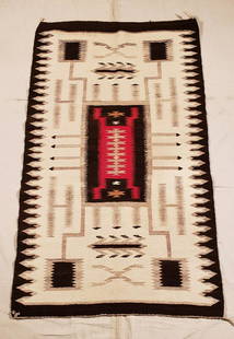 Navajo storm pattern rug ca 1950: Title: Navajo storm pattern rug ca 1950'sDimension:50" long x 29 1/2" wide Provenance:Excellent condition. Vibrant red central element radiating to the four sacred mountains. Waterbug and corn