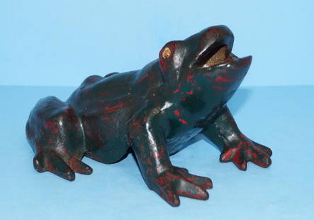 Antique Cast Iron Penny Pitch Frog Doorstop: Title: Antique Cast Iron Penny Pitch Frog Doorstop Date/Period: Circa early 1900's Dimension: 4 3/4" tall x 8 1/2" long x 6 3/4" wide Provenance:An Antique Cast Iron Penny Pitch Frog. This LARGE size