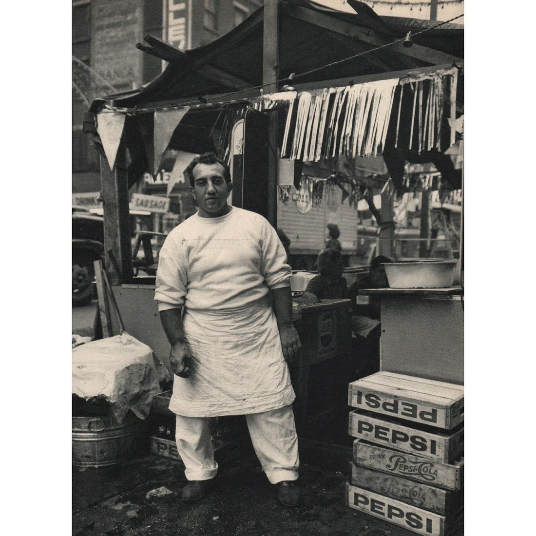 EVELYN HOFER - Little Italy, New York City: Artist: EVELYN HOFER Print Title: Little Italy, New York City Medium: Sheet-fed Gravure Printing Date: 1960's Printed in Switzerland Image Size: 11 x 8.25 inches Evelyn Hofer (1922-2009) was a German-