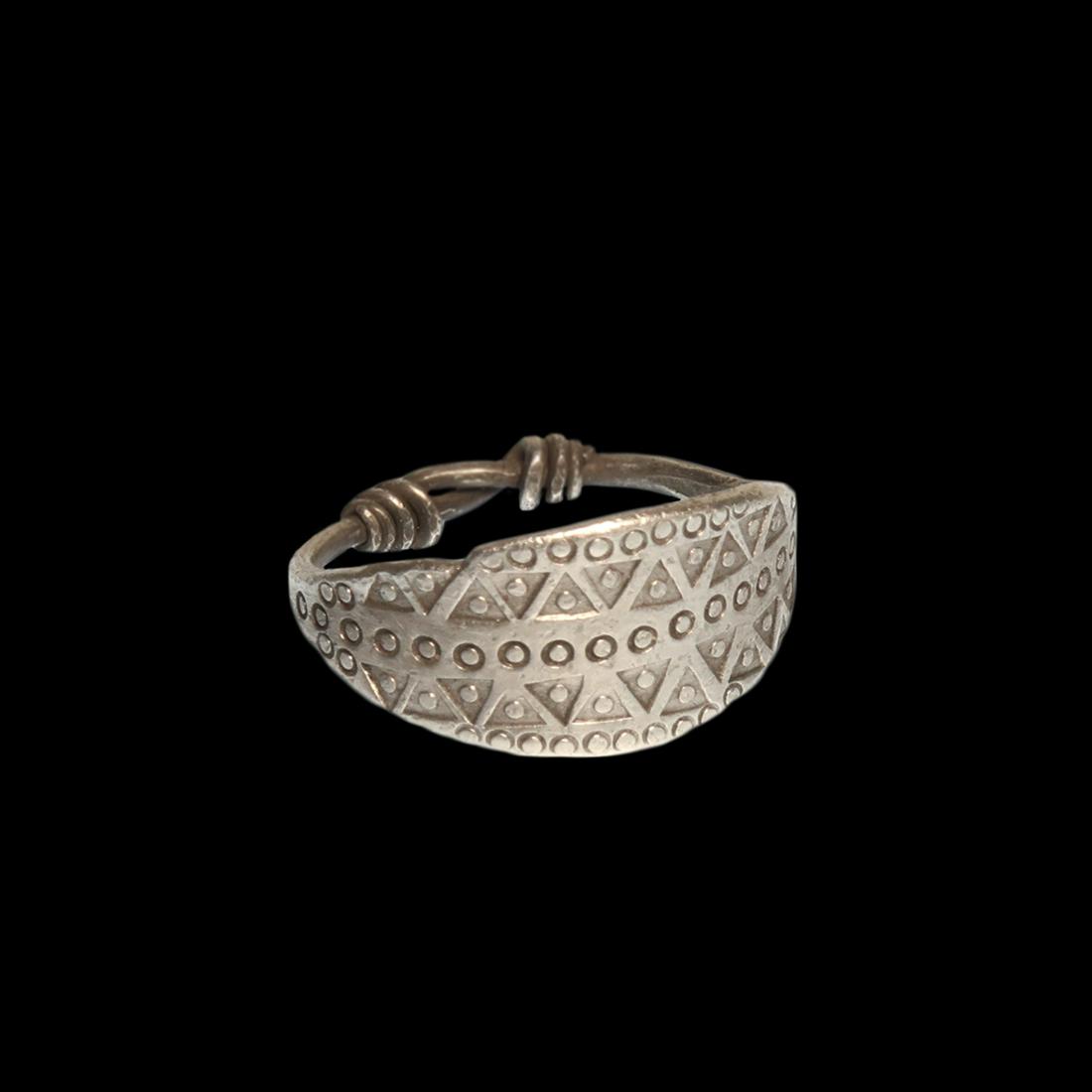Viking Silver Ring with Wolf's Tooth Decoration, c. 9th: Title: Viking Silver Ring with Wolf's Tooth Decoration, c. 9th - 11th century A.D. Date & Origin: Viking, c. 9th - 11th century A.D. Material: Silver, 6.1 grams Dimension: USA= 10 - GB= U - 2 cm insid