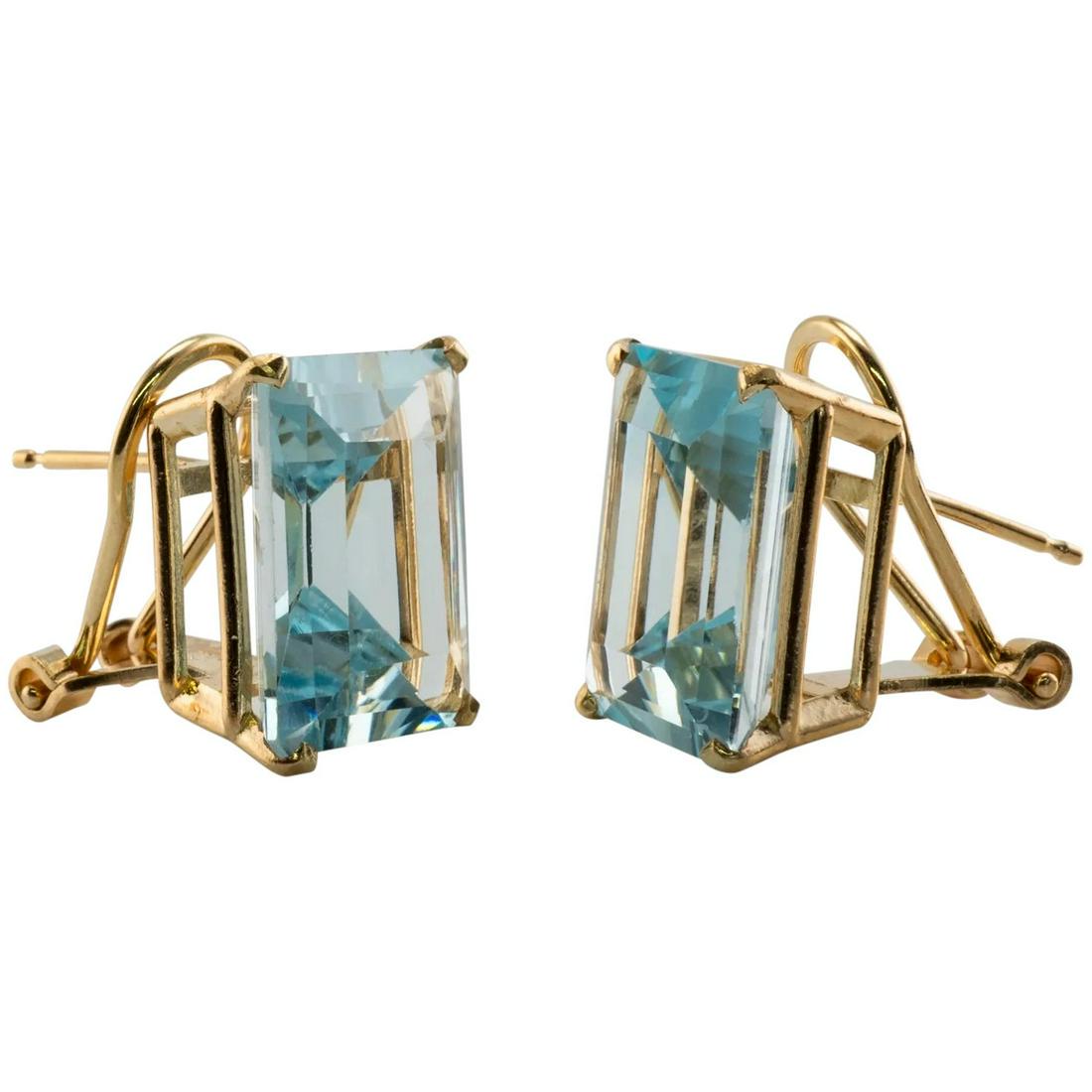 Aquamarine Earrings 14K Gold Natural Genuine Omega: This elegant pair of earrings is finely crafted in solid 14K Yellow Gold (stamped and carefully tested) and set with Natural Earth mined Aquamarines. Each Aqua measures 12mm x 10mm (9.50 cttw for the 